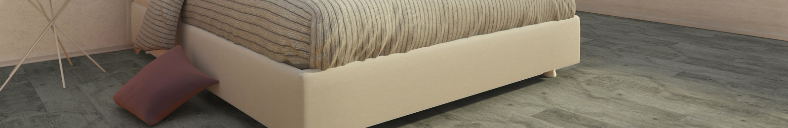 Ornato Hybrid flooring in Coastal Blackbutt design under a bed, showcasing durability and style in a modern bedroom setting.